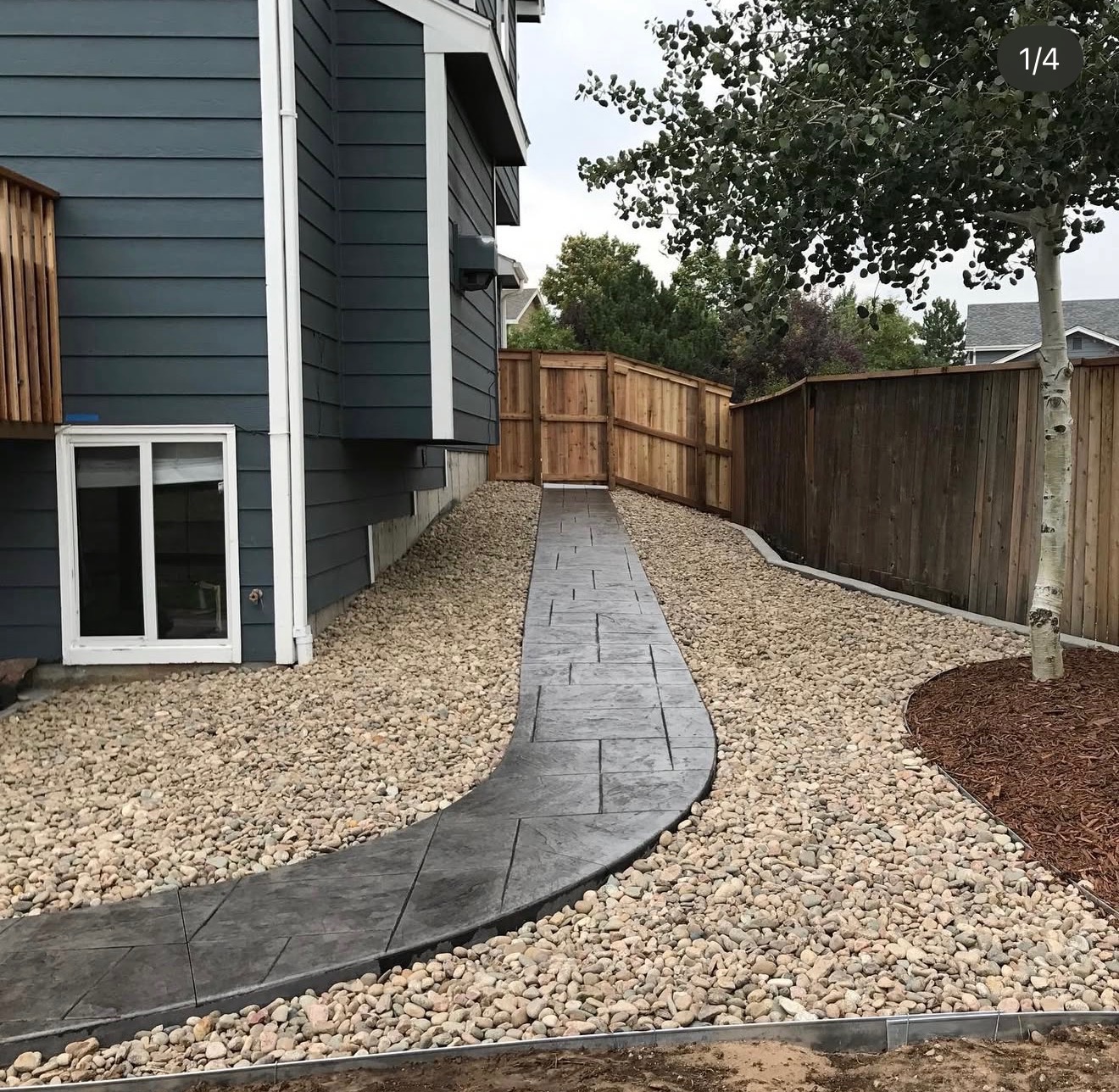 Stamped concrete walkway with decorative finish