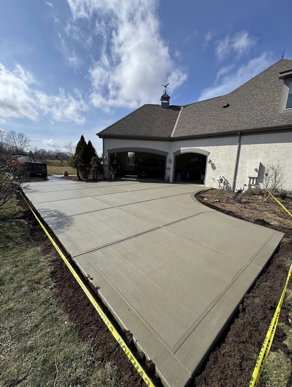 Driveway after concrete replacement - finished concrete slab