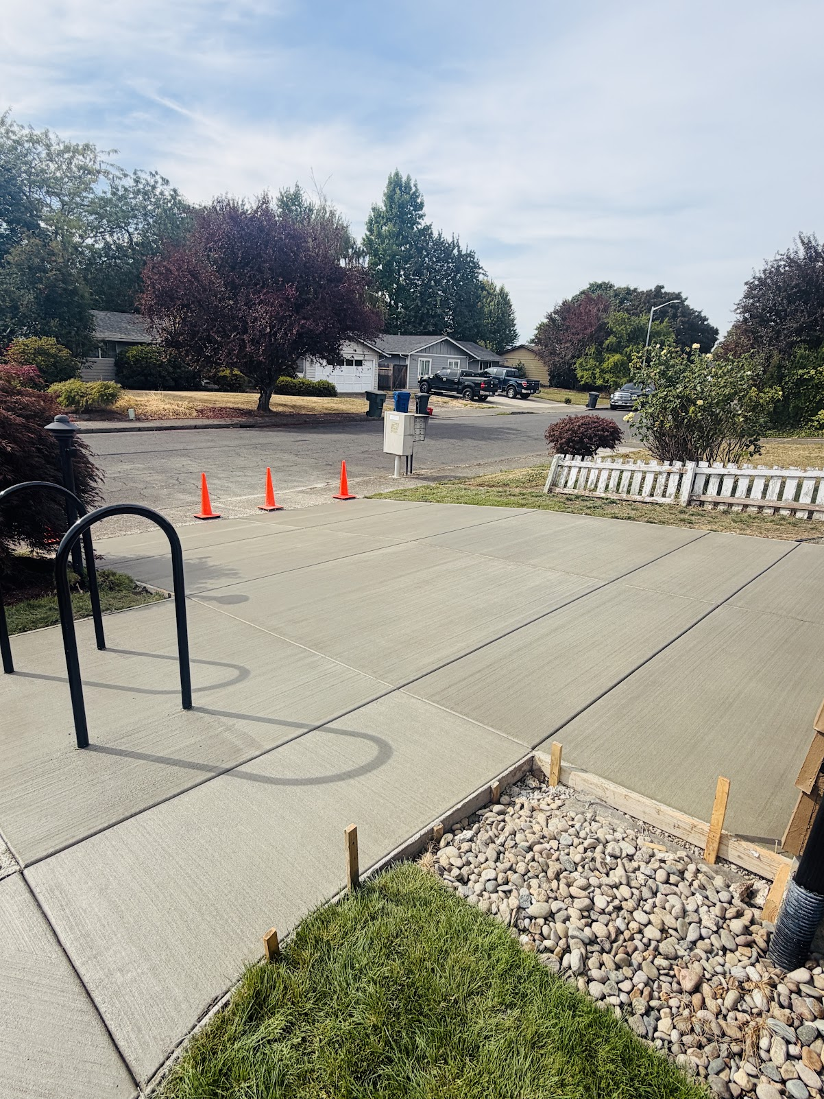 Completed broom-finished concrete driveway